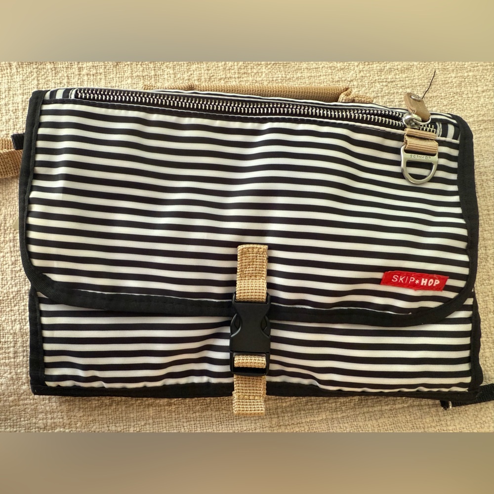Skip Hop changing mat black and white stripes